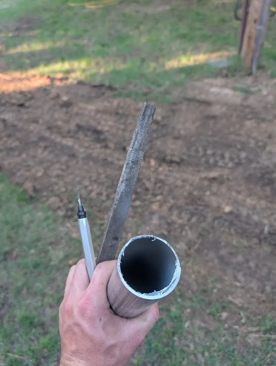 Freshly cut 2\" EMT showing a rough, burred edge
