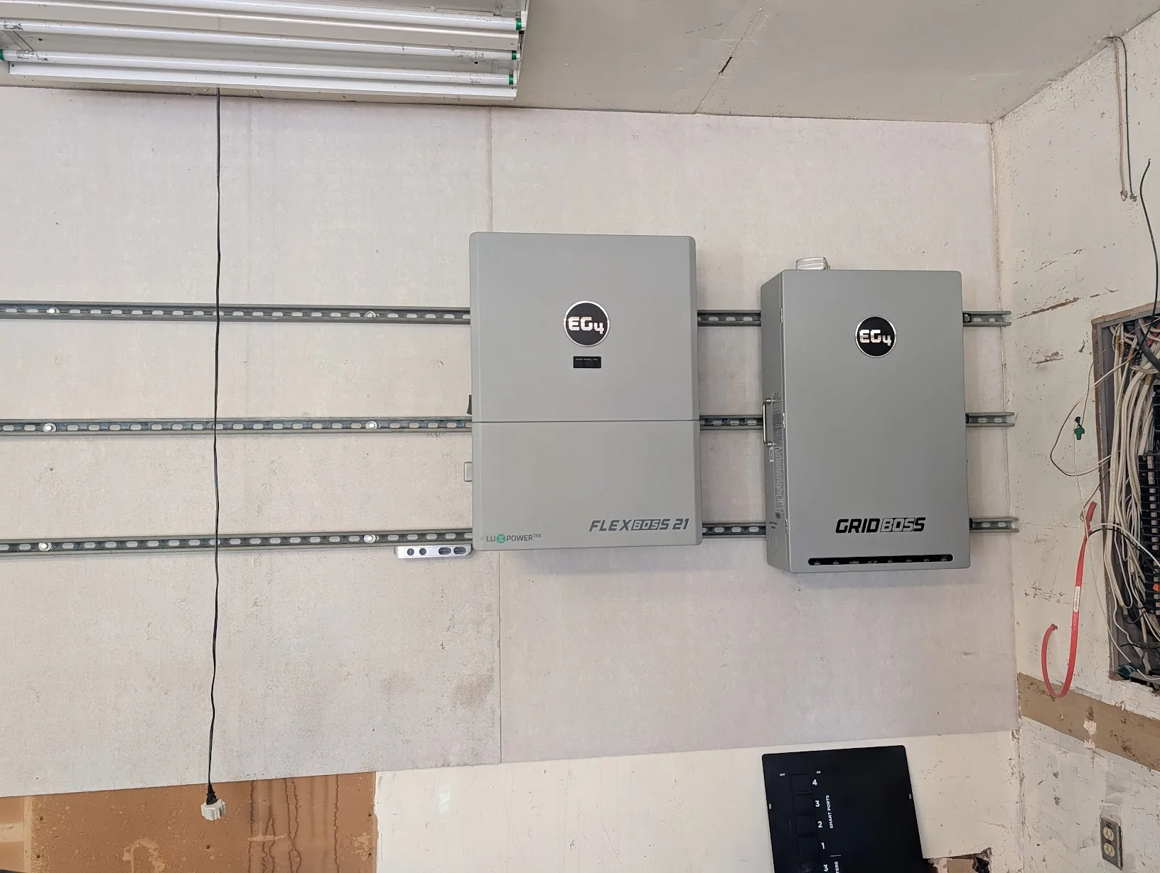 Garage wall after Part 1 — only the FlexBoss21 and GridBoss were mounted on the strut