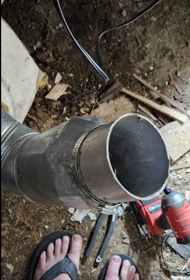 5" pipe clamped around section of 4" driveshaft from old racecar