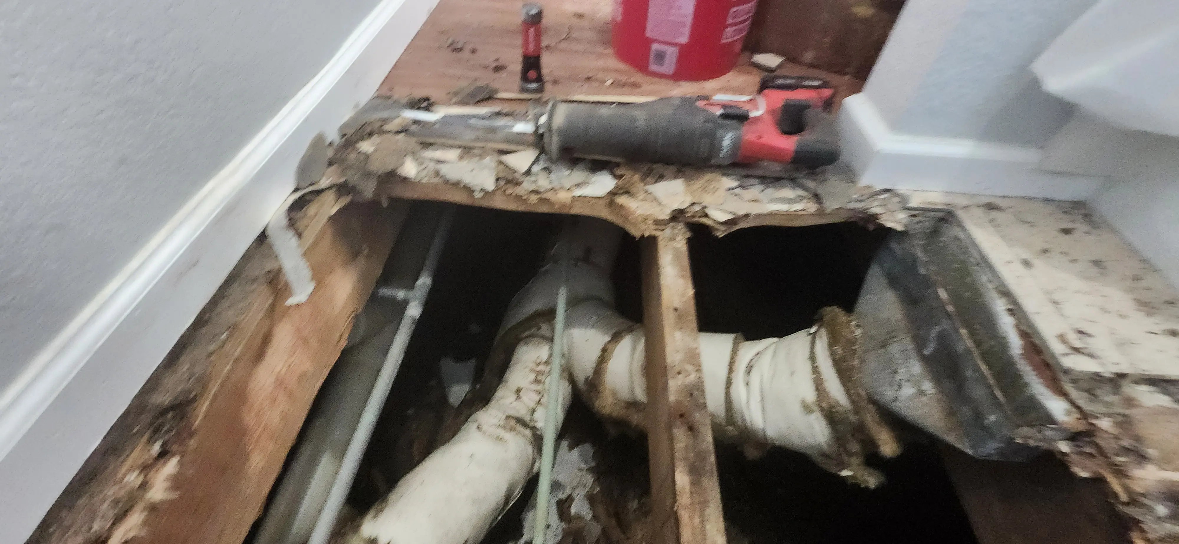 Picture showing the entry to the bathroom, after mostly being cleaned up
