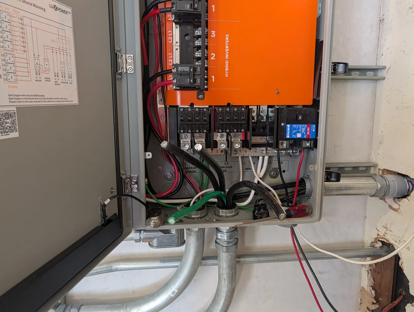 4/0 cable bent and dressed into the main panel terminations