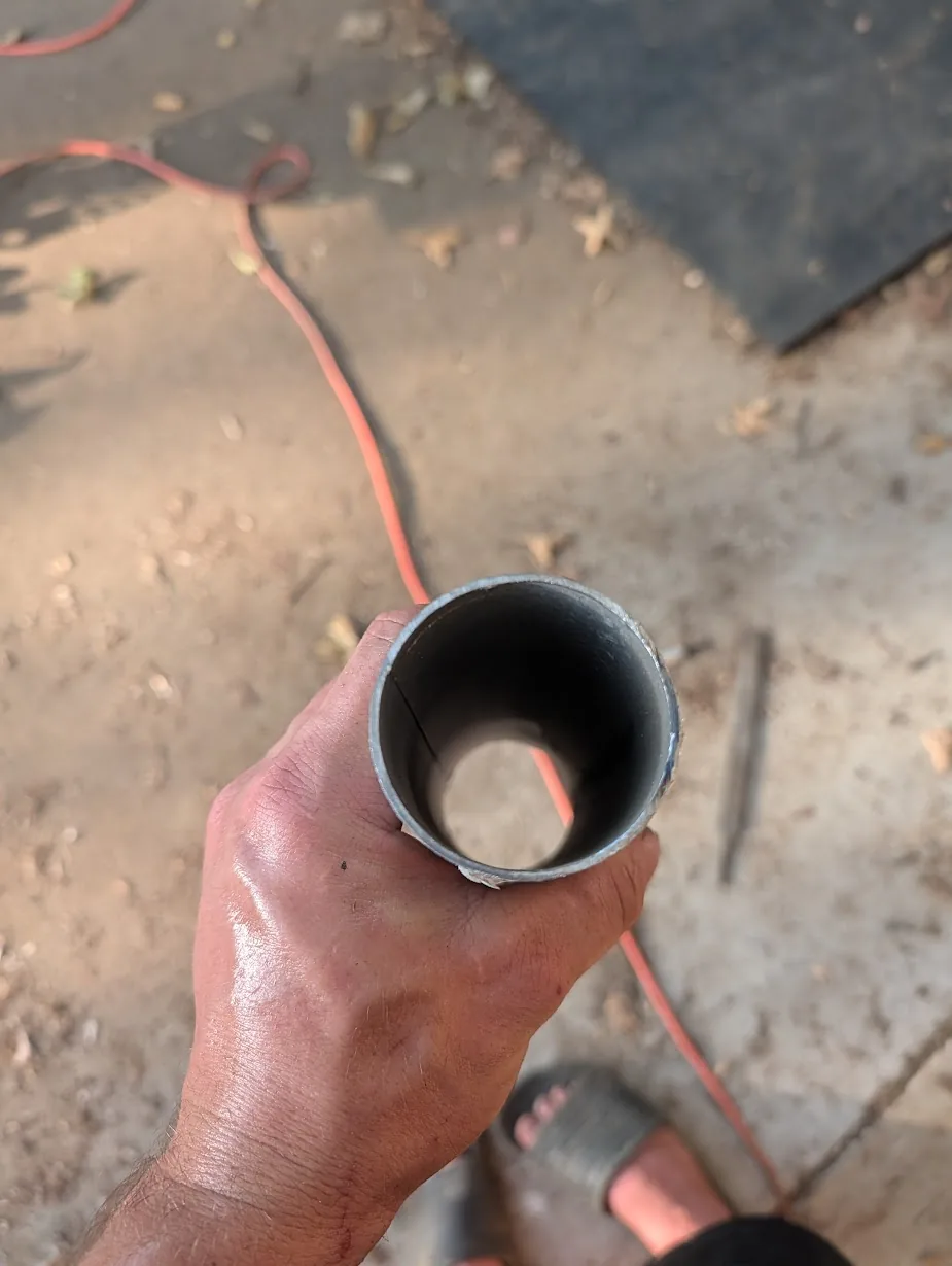 Same 2" EMT after deburring — clean, smooth inside edge
