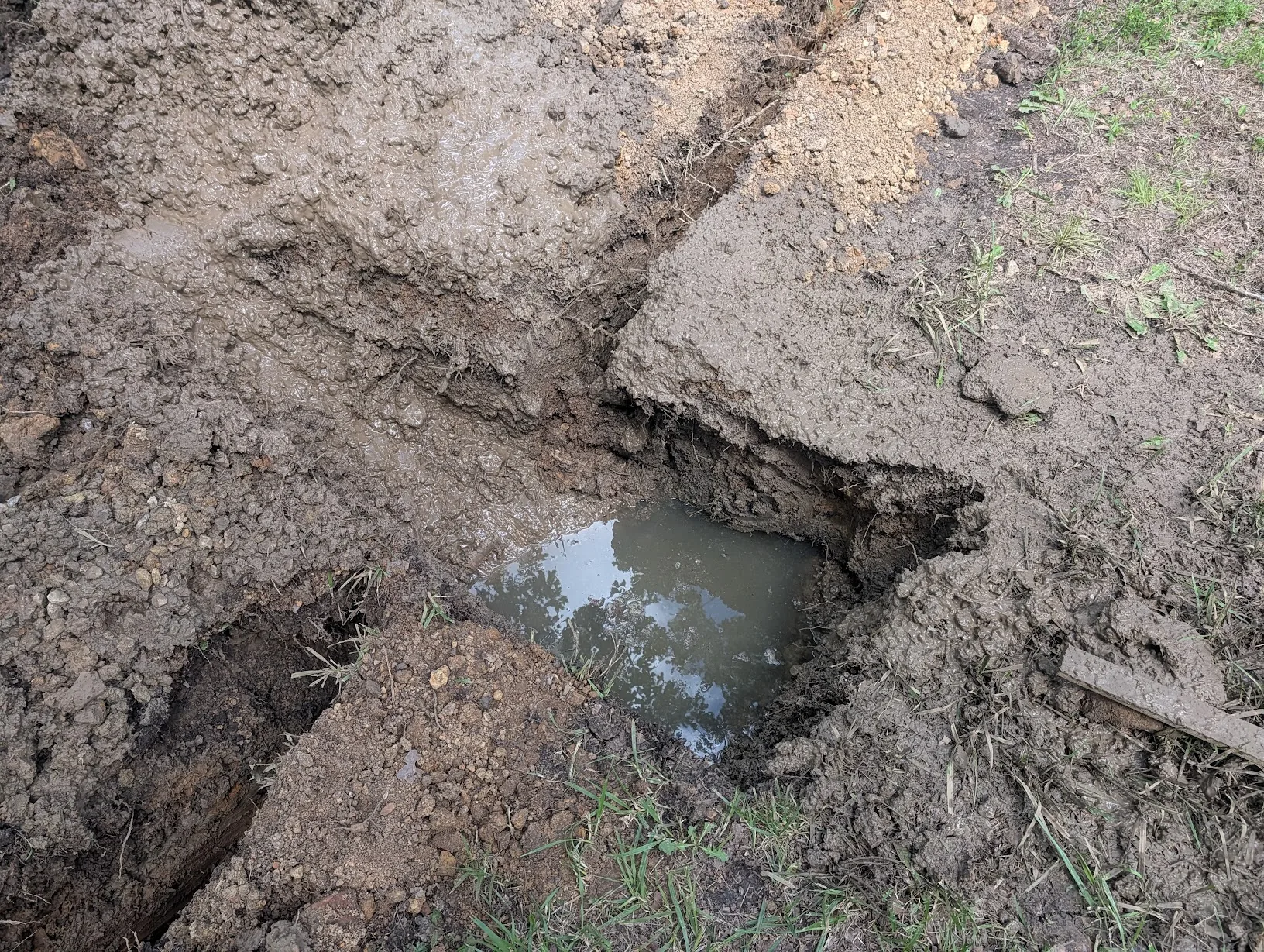 Septic lateral line exposed for repair