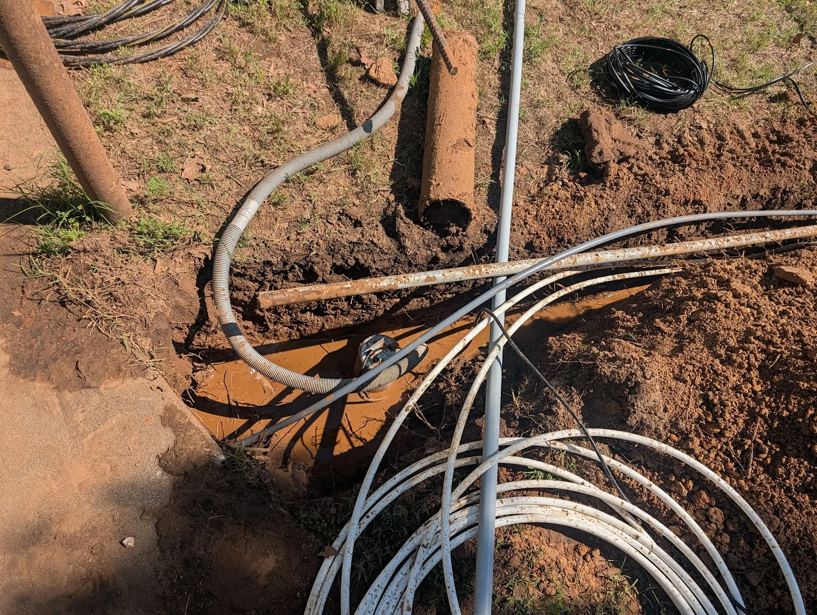 Trench filling with mud during pressure-washer tunneling