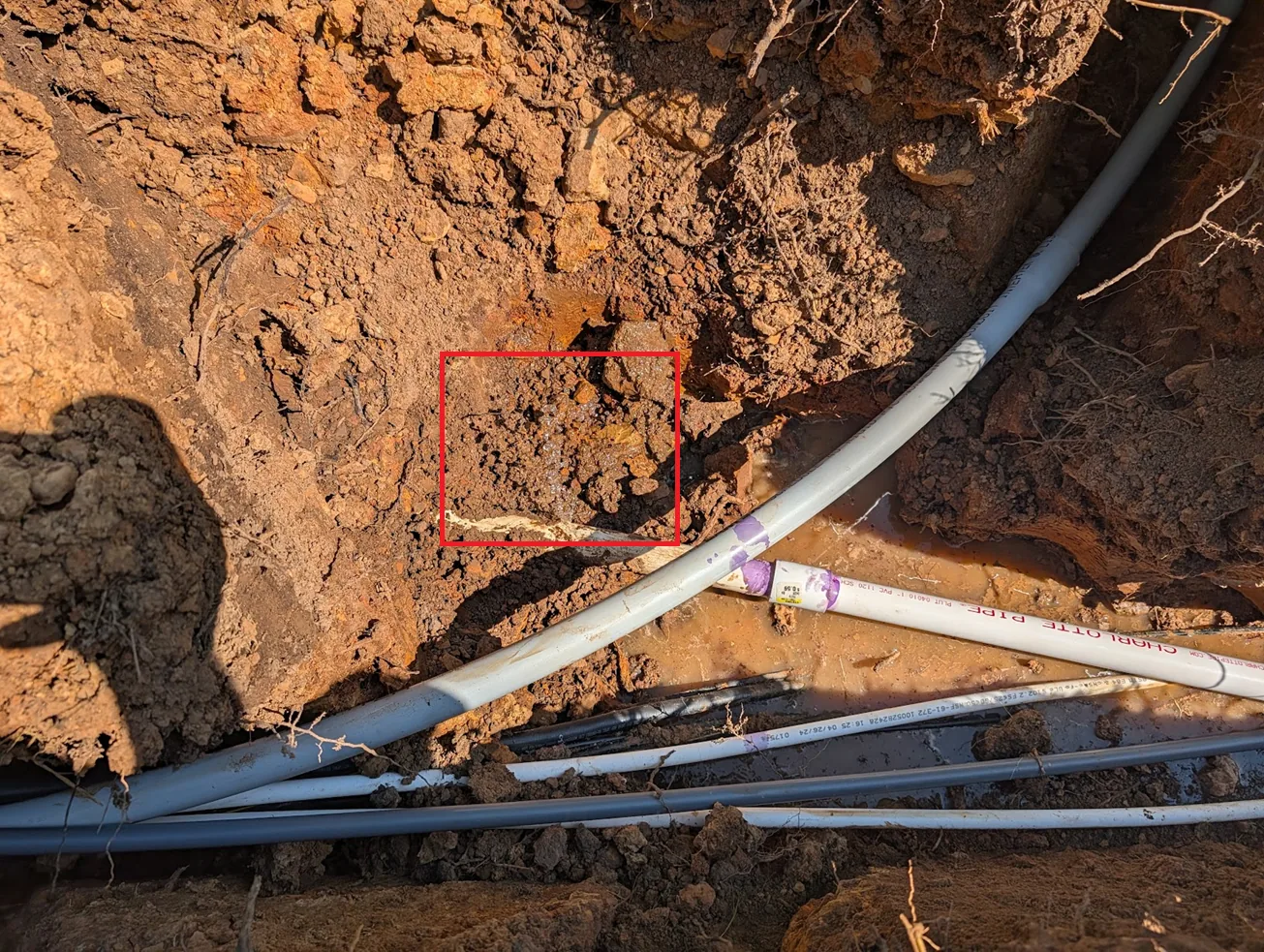 Water still leaking upstream and downstream of the patched section